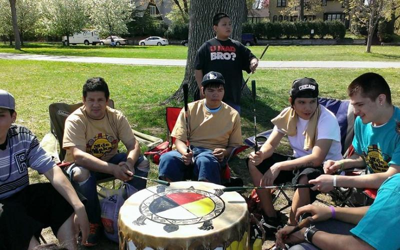 Singing at Mde Maka Ska Canoe Nations Gathering