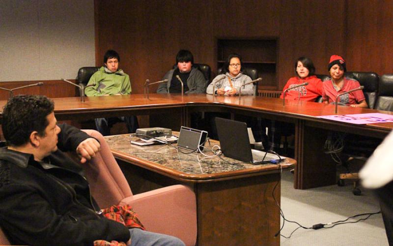 Students sitting in a conference room